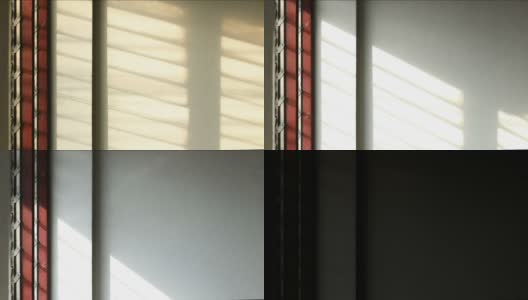 时间流逝:阳光透过百叶窗照到白色的混凝土墙壁上。高清在线视频素材下载