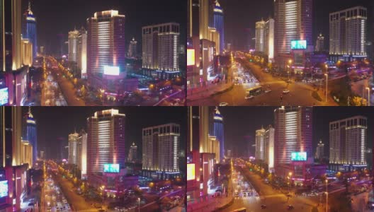 青岛市夜间时间照亮市中心繁忙交通街道十字路口航拍4k中国全景图高清在线视频素材下载