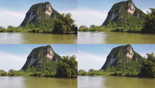 河上游弋着中国乡村的石灰岩景观和山水景观高清在线视频素材下载