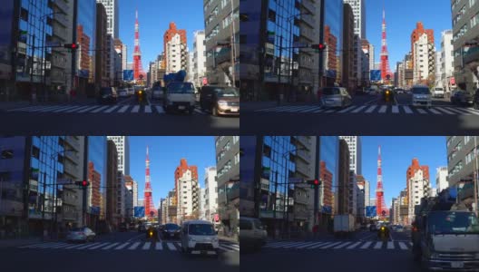 日本东京繁忙的街道和东京塔在远处。高清在线视频素材下载