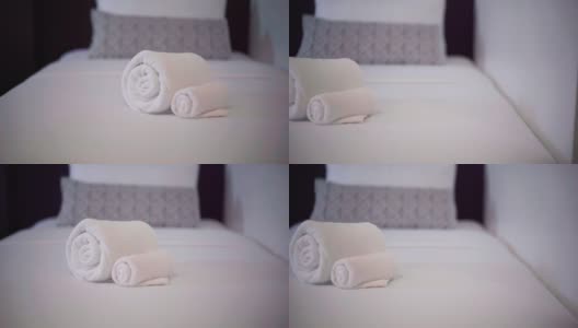 酒店房间的床上有白色毛巾高清在线视频素材下载