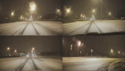 在冬天的城市里，在下雪的路上开车高清在线视频素材下载