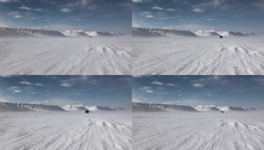 越野车在北极斯匹次卑尔根斯瓦尔巴特群岛北极。高清在线视频素材下载