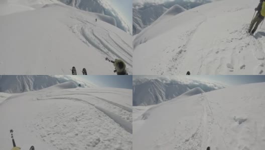 高山滑雪者下粉坡的POV高清在线视频素材下载