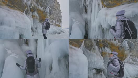 女人在贝加尔湖冰面上的旅行。冬岛之旅。女孩在冰岩石下行走。游客看着美丽的冰洞。极限跋涉和步行。背包客在大自然中休憩。高清在线视频素材下载
