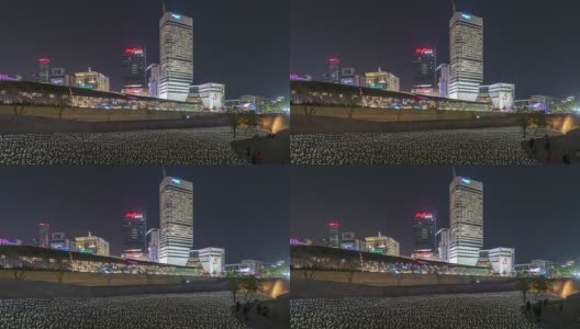 夜间延时拍摄的广场和城市天际线高清在线视频素材下载