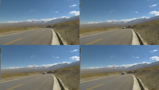 当地人开车穿过令人叹为观止的喜马拉雅高原平原。高清在线视频素材下载