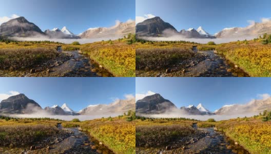 阿西尼博因山的风景与雾和河流在加拿大阿尔伯塔金色的田野流动高清在线视频素材下载
