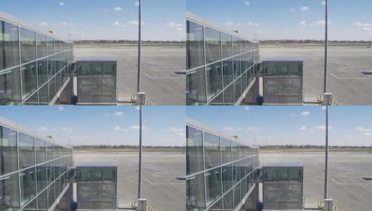 机场跑道和玻璃航站楼，飞机工业的美丽景色高清在线视频素材下载