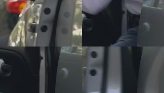 一个人从车里出来，用钥匙锁上，安全措施，特写镜头高清在线视频素材下载