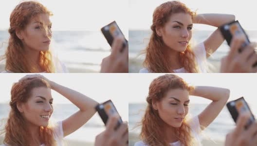 在海滩上用智能手机自拍的快乐女人高清在线视频素材下载