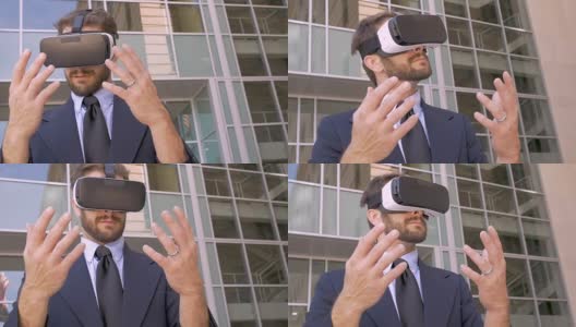 英俊的商人在虚拟现实增强世界与VR眼镜高清在线视频素材下载