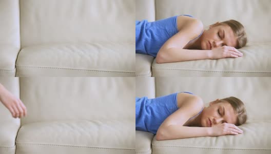 小女孩倒在沙发上，躺着昏睡过去，感觉筋疲力尽高清在线视频素材下载