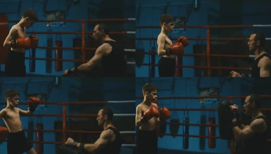 男人和男孩一起练拳击高清在线视频素材下载