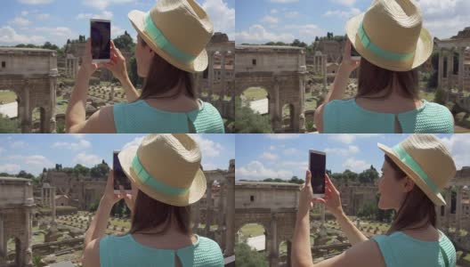 一名女子在罗马广场附近用手机拍照。女游客在罗马广场拍照高清在线视频素材下载