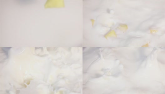 芒果掉进牛奶的慢动作视频高清在线视频素材下载