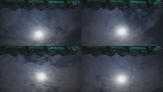 夜景的庙宇屋檐与月亮和云移动高清在线视频素材下载