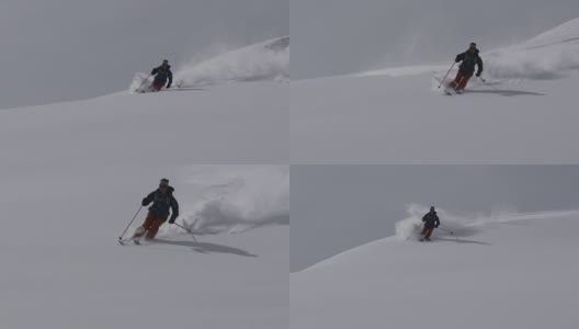 乡间滑雪者下山，积着厚厚的粉雪高清在线视频素材下载