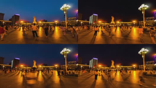中国沈阳，2014年8月1日:晚上，人们(大妈)在中山广场跳舞高清在线视频素材下载