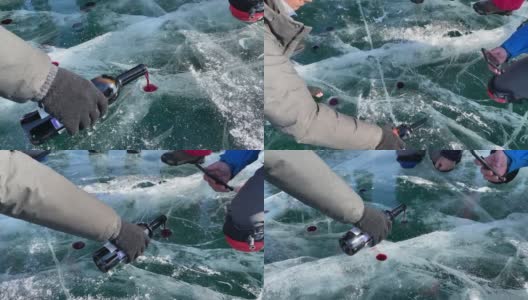 贝加尔湖之吻是游客的娱乐活动。一名男子将冰冻的贝加尔湖上的葡萄酒倒入临时搭建的玻璃杯中。高清在线视频素材下载