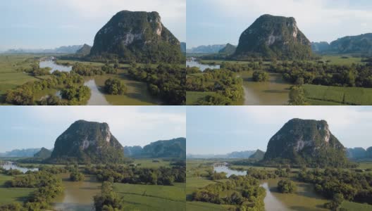 中国农村的石灰岩景观和风景优美的河流在广西的稻田周围高清在线视频素材下载