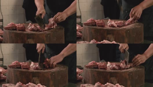 屠夫在旧市场切新鲜的肉高清在线视频素材下载
