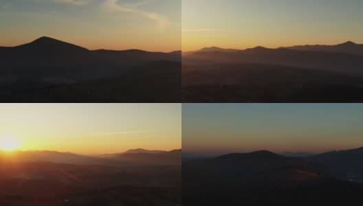 日出或日落时，在崎岖的山脉上360度旋转，火红的太阳在色彩斑斓的橙色天空中从地平线上升起高清在线视频素材下载