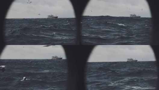 在波涛汹涌的海面上出海的渔船高清在线视频素材下载