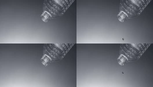 水从塑料瓶里滴出来，慢动作高清在线视频素材下载