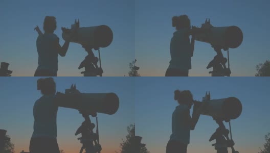 女孩用望远镜看星星。高清在线视频素材下载