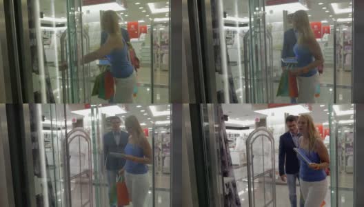 在塞萨洛尼基的商店里，希腊一对年轻夫妇走进电梯高清在线视频素材下载