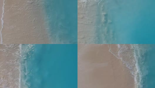 在格雷斯湾，普罗维登夏莱斯，特克斯和凯科斯群岛海浪撞击海滩的无人机鸟瞰图高清在线视频素材下载