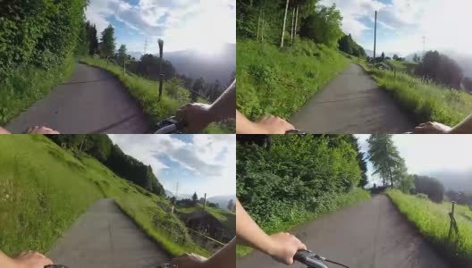 骑自行车的人沿着乡间小路穿过森林高清在线视频素材下载