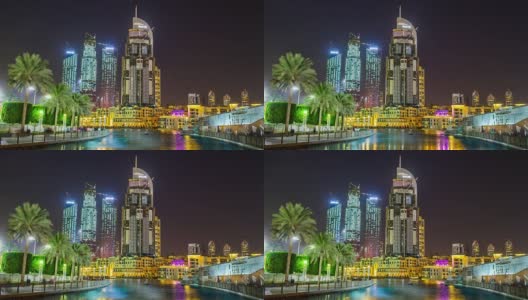阿拉伯联合酋长国迪拜购物中心喷泉区著名酒店建筑的夜间照明4k时间流逝高清在线视频素材下载