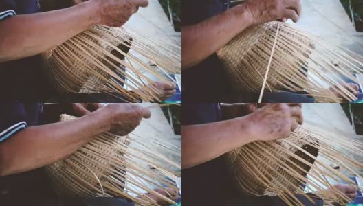 泰国清迈村民手工编织竹篮。高清在线视频素材下载