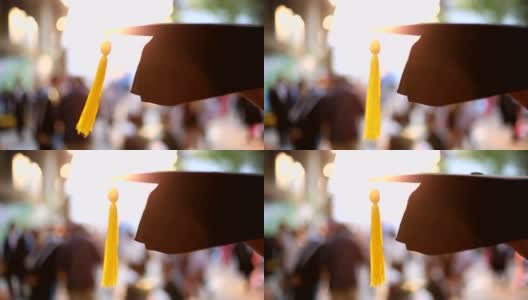 毕业帽在毕业生手中高清在线视频素材下载