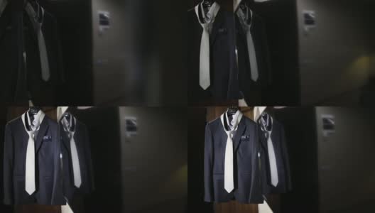 男士西装和领带挂在衣架上高清在线视频素材下载