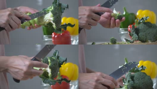 女厨师在木板上切花椰菜高清在线视频素材下载