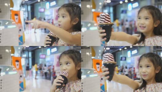 女孩在吃蛋筒冰淇淋高清在线视频素材下载