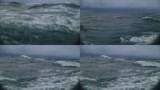从一艘船的舷窗在暴风雨的海上高清在线视频素材下载