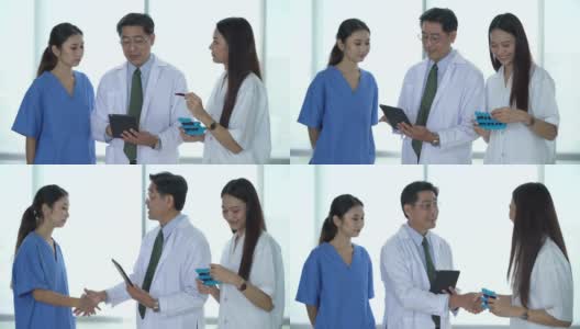 男医生在医院和医疗团队握手高清在线视频素材下载