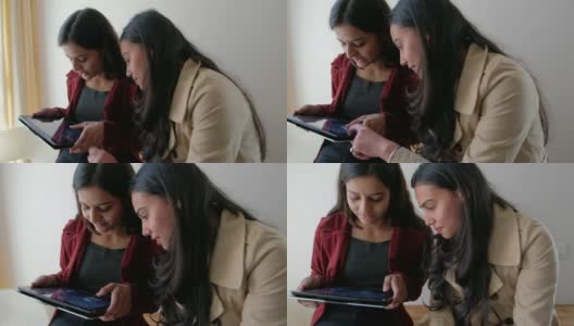 女孩朋友在网上分享一些手持电子设备，稳定的万向节拍摄高清在线视频素材下载