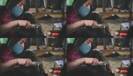 中东男学生在大学工作台擦拭珠宝高清在线视频素材下载