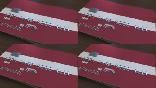 带有拉脱维亚国旗的塑料银行卡。拉脱维亚国家银行系统相关动画高清在线视频素材下载