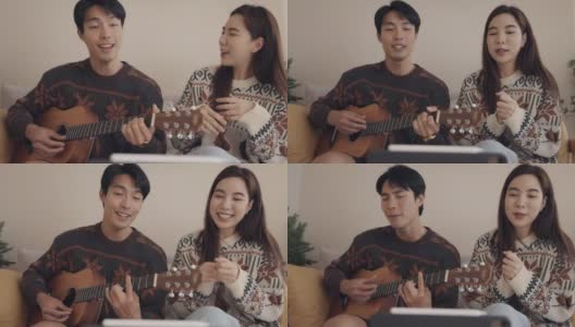 年轻夫妇在客厅里一起唱歌玩得很开心高清在线视频素材下载