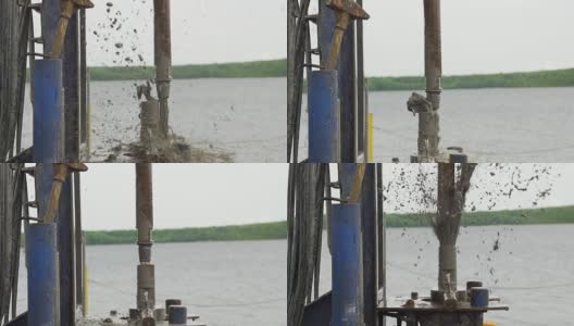 泥浆水从钻杆喷射缓慢运动高清在线视频素材下载