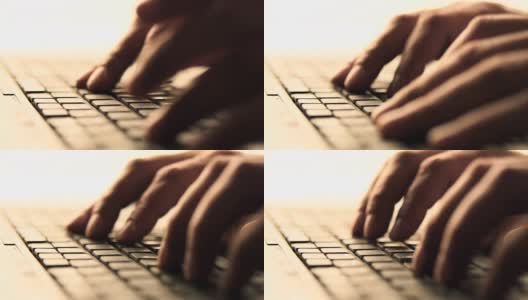 男性用手敲击笔记本电脑键盘的特写镜头高清在线视频素材下载