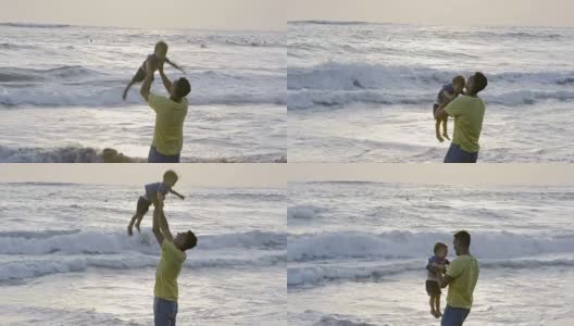 男人和小男孩在海滩上玩耍高清在线视频素材下载