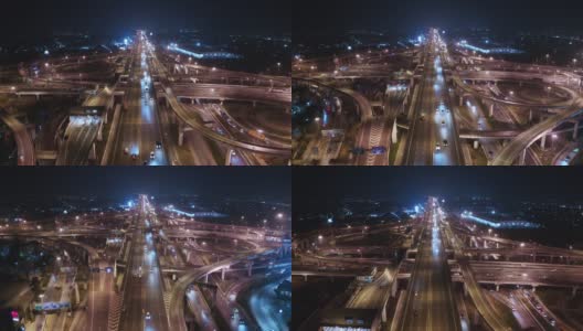 鸟瞰夜间公路交叉口，汽车交通与运输技术概念高清在线视频素材下载