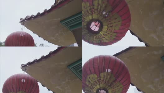 镜头在中国的灯笼和寺庙下移动高清在线视频素材下载